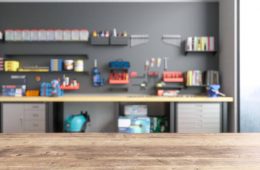 Empty Wooden Table Top With Blur Garage Interior